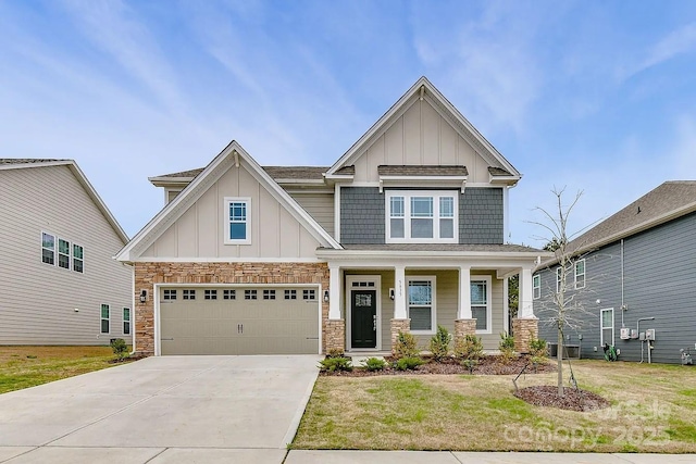 5635 Agora Ct, Lancaster, SC 29720 - craftsman-style house featuring board and batten siding, driveway, and stone siding