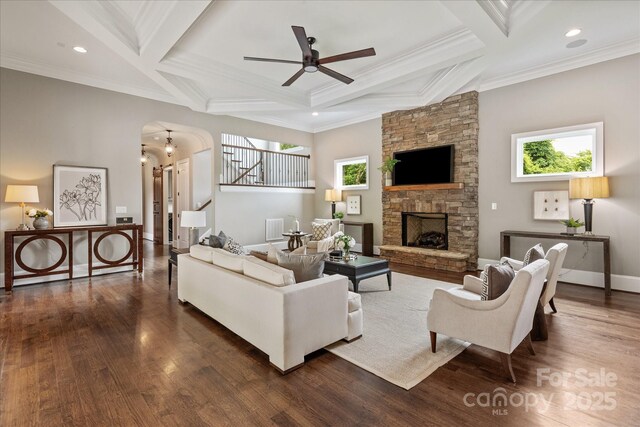 1501 Alydar Ct, Waxhaw, NC 28173 - living area featuring plenty of natural light, coffered ceiling, dark wood-style floors, a ceiling fan, and arched walkways