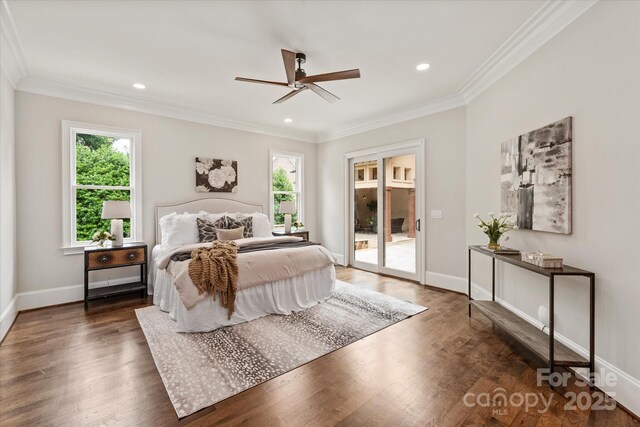 1501 Alydar Ct, Waxhaw, NC 28173 - bedroom featuring access to exterior, multiple windows, wood finished floors, crown molding, and baseboards