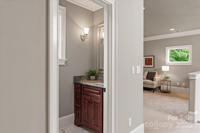 1501 Alydar Ct, Waxhaw, NC 28173 - bathroom featuring vanity, crown molding, baseboards, and recessed lighting