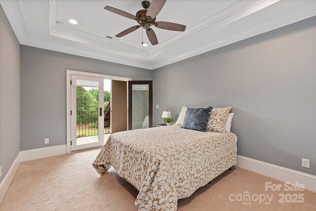 1501 Alydar Ct, Waxhaw, NC 28173 - carpeted bedroom with access to exterior, crown molding, a raised ceiling, recessed lighting, and baseboards