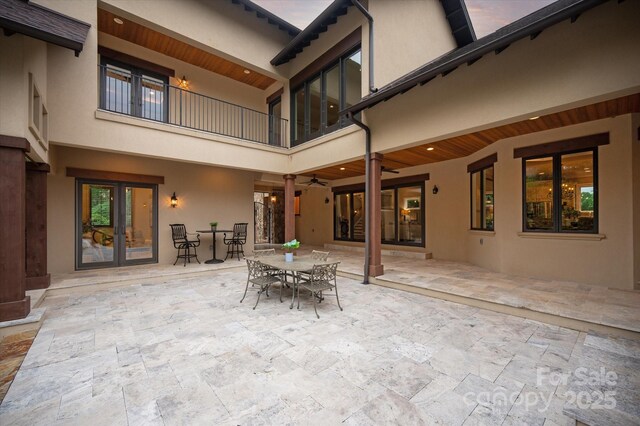 1501 Alydar Ct, Waxhaw, NC 28173 - view of patio / terrace with french doors, outdoor dining area, a balcony, and a ceiling fan