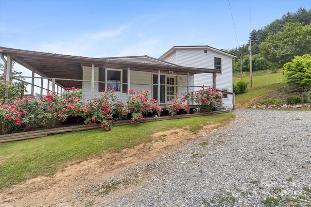 461 Tweed Rd, Madison, NC 28753 - view of front of property featuring a porch, a front yard, and driveway