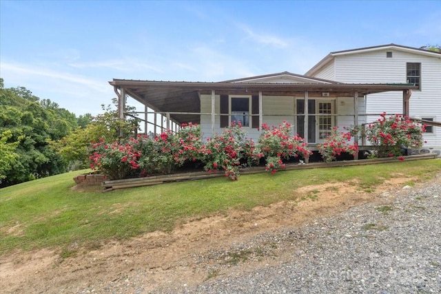 461 Tweed Rd, Madison, NC 28753 - view of home's exterior featuring a yard and covered porch