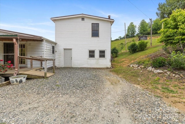 461 Tweed Rd, Madison, NC 28753 - rear view of house featuring a wooden deck and driveway