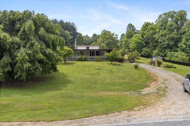 461 Tweed Rd, Madison, NC 28753 - view of grassy yard featuring driveway
