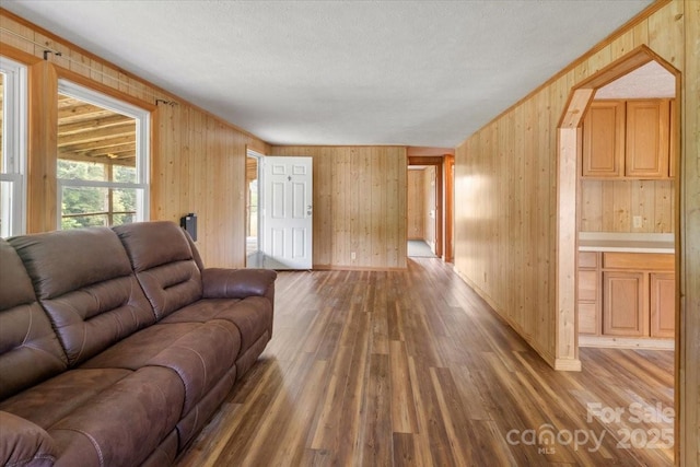 461 Tweed Rd, Madison, NC 28753 - living area with wood finished floors, wooden walls, and a textured ceiling