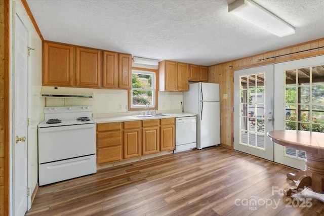 461 Tweed Rd, Madison, NC 28753 - kitchen featuring white appliances, ventilation hood, a textured ceiling, light countertops, and light wood-type flooring