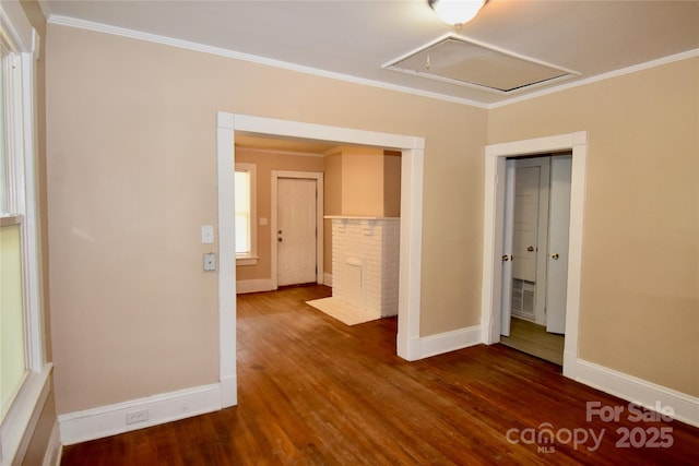 2017 Ashley Rd, Charlotte, NC 28208 - spare room featuring attic access, wood finished floors, and crown molding