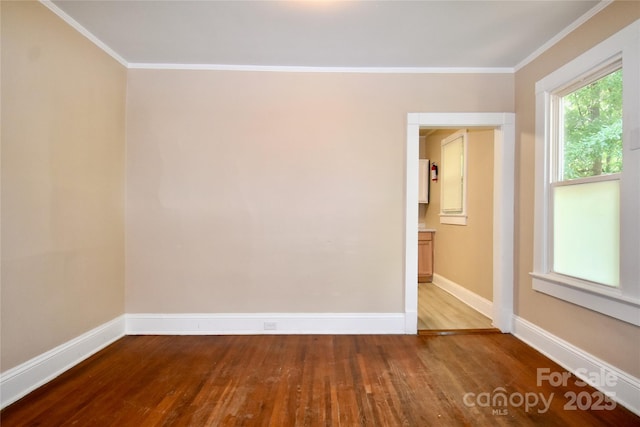 2017 Ashley Rd, Charlotte, NC 28208 - unfurnished room featuring wood finished floors and crown molding