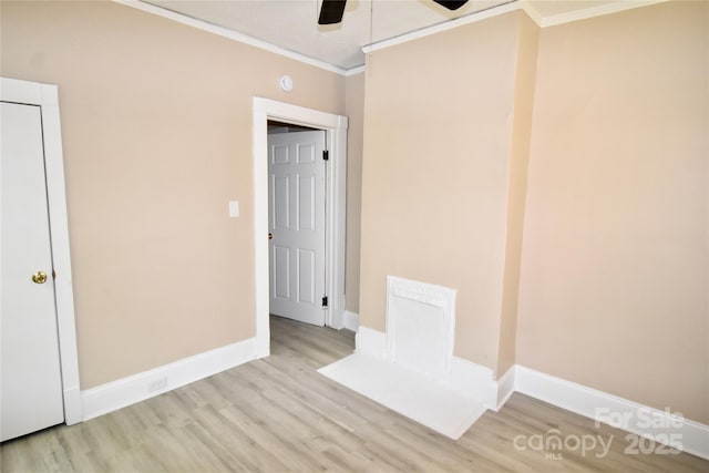 2017 Ashley Rd, Charlotte, NC 28208 - spare room featuring ornamental molding, wood finished floors, and ceiling fan