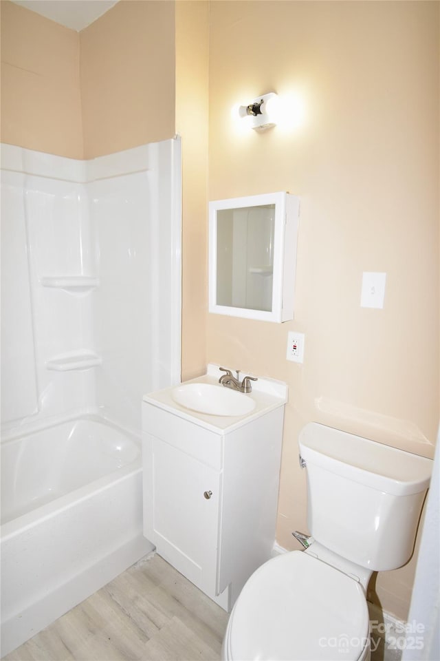 2017 Ashley Rd, Charlotte, NC 28208 - bathroom with vanity, wood finished floors, and bathtub / shower combination