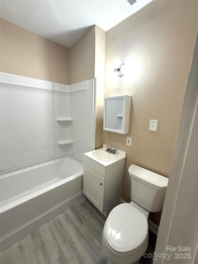 2017 Ashley Rd, Charlotte, NC 28208 - bathroom with vanity, wood finished floors, and  shower combination