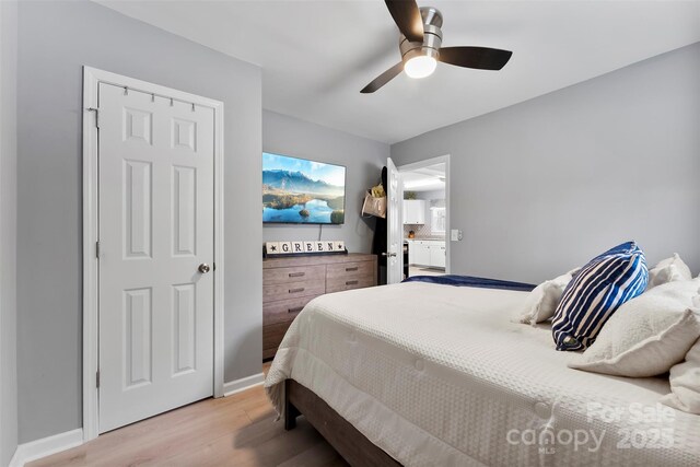 310 S Jacob St, Cherryville, NC 28021 - bedroom featuring light wood-style floors, a ceiling fan, and baseboards