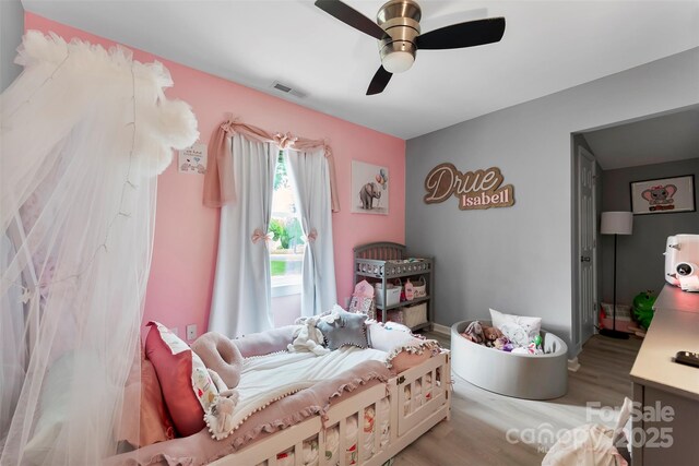 310 S Jacob St, Cherryville, NC 28021 - bedroom featuring wood finished floors and ceiling fan