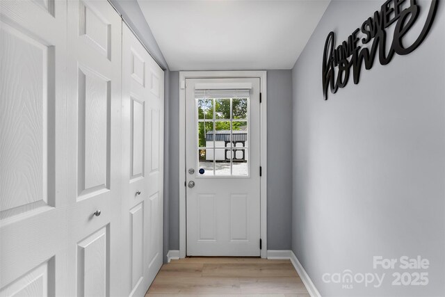 310 S Jacob St, Cherryville, NC 28021 - doorway featuring light wood-style floors and baseboards
