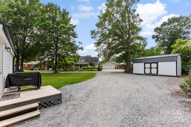 310 S Jacob St, Cherryville, NC 28021 - view of grassy yard featuring a detached garage