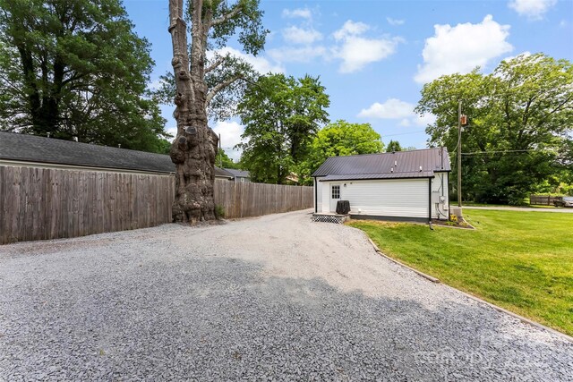 310 S Jacob St, Cherryville, NC 28021 - view of side of property with metal roof