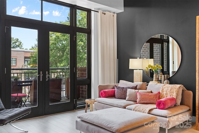 720 Governor Morrison St Unit 219, Charlotte, NC 28211 - living area with wood finished floors and french doors