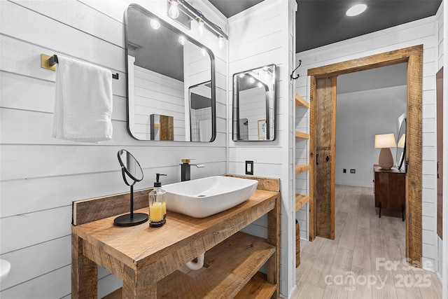 720 Governor Morrison St Unit 219, Charlotte, NC 28211 - bathroom featuring wood finished floors and vanity