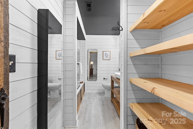 720 Governor Morrison St Unit 219, Charlotte, NC 28211 - full bath featuring toilet and wood finished floors