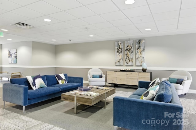 720 Governor Morrison St Unit 219, Charlotte, NC 28211 - living area with a paneled ceiling, recessed lighting, and light carpet