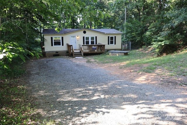 226 Lake Sylvia Rd, Lincolnton, NC 28092 - manufactured / mobile home featuring a deck, crawl space, and driveway
