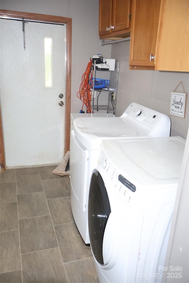 226 Lake Sylvia Rd, Lincolnton, NC 28092 - washroom with washing machine and dryer and cabinet space