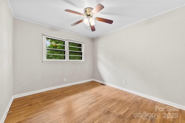 1156 Westover Cir, Rock Hill, SC 29732 - empty room with hardwood / wood-style flooring, crown molding, baseboards, and ceiling fan