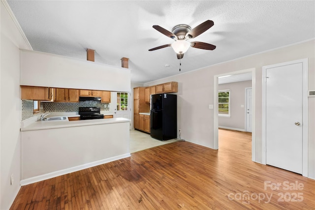 1156 Westover Cir, Rock Hill, SC 29732 - kitchen featuring black appliances, under cabinet range hood, ceiling fan, light countertops, and light wood-style flooring