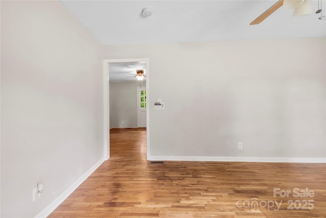 1156 Westover Cir, Rock Hill, SC 29732 - unfurnished room featuring a ceiling fan, wood finished floors, baseboards, and a smoke detector