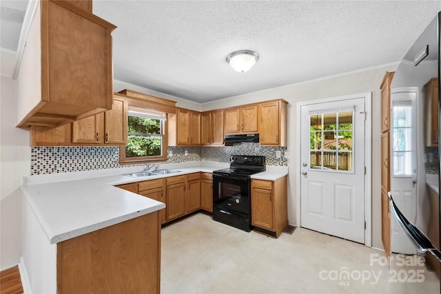 1156 Westover Cir, Rock Hill, SC 29732 - kitchen featuring electric range, under cabinet range hood, light countertops, decorative backsplash, and a peninsula