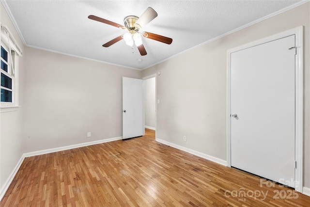 1156 Westover Cir, Rock Hill, SC 29732 - unfurnished bedroom with light wood-type flooring, baseboards, ornamental molding, and a ceiling fan