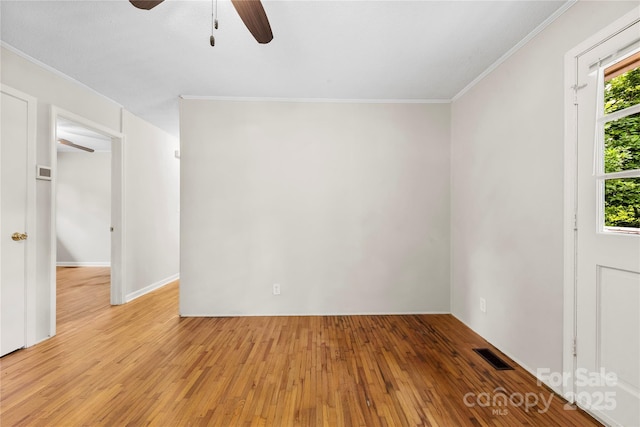 1156 Westover Cir, Rock Hill, SC 29732 - unfurnished room with light wood-style floors, a ceiling fan, and crown molding