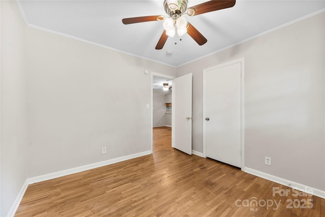 1156 Westover Cir, Rock Hill, SC 29732 - empty room with a ceiling fan, light wood-type flooring, baseboards, ornamental molding, and a smoke detector