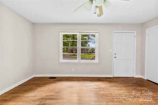 1156 Westover Cir, Rock Hill, SC 29732 - entrance foyer with wood finished floors, baseboards, ceiling fan, and a textured ceiling