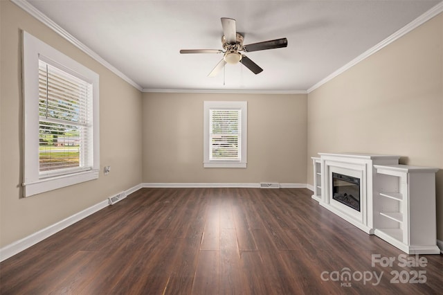 516 Boss Moore Rd, Ellenboro, NC 28040 - unfurnished living room with dark wood-type flooring, ceiling fan, baseboards, a glass covered fireplace, and crown molding