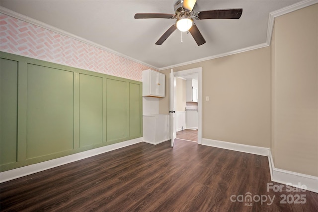 516 Boss Moore Rd, Ellenboro, NC 28040 - empty room with ornamental molding, ceiling fan, dark wood-type flooring, a decorative wall, and baseboards