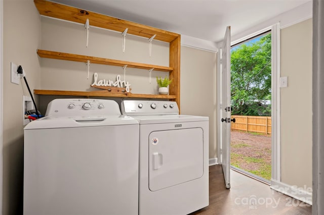 516 Boss Moore Rd, Ellenboro, NC 28040 - laundry room featuring independent washer and dryer and wood finished floors