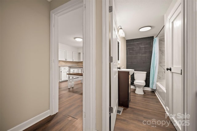 516 Boss Moore Rd, Ellenboro, NC 28040 - hall featuring dark wood-style floors