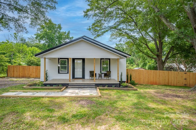 516 Boss Moore Rd, Ellenboro, NC 28040 - bungalow-style house featuring a porch
