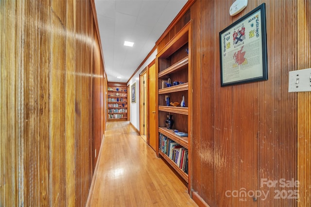 162 Candle St, West Jefferson, NC 28694 - hallway with light wood finished floors, built in features, and wood walls