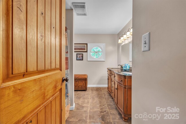 162 Candle St, West Jefferson, NC 28694 - full bathroom featuring vanity and baseboards