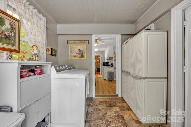 162 Candle St, West Jefferson, NC 28694 - washroom with ornamental molding, cabinet space, ceiling fan, washing machine and clothes dryer, and stone finish flooring