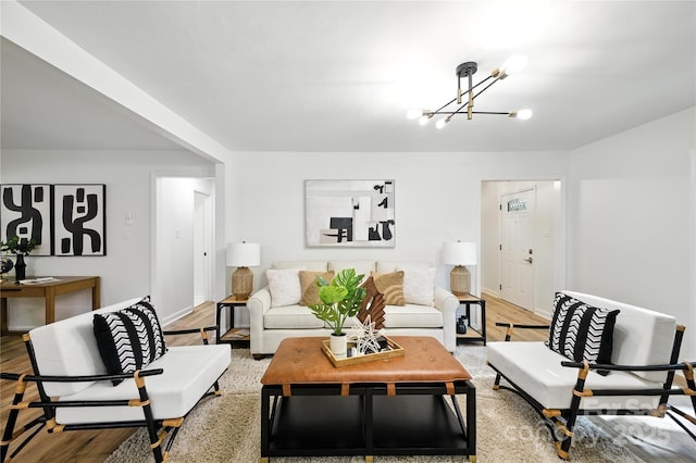 6127 Eagle Peak Dr, Charlotte, NC 28214 - living area with a chandelier and light wood-type flooring