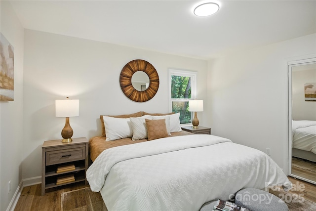 6127 Eagle Peak Dr, Charlotte, NC 28214 - bedroom with wood finished floors and baseboards
