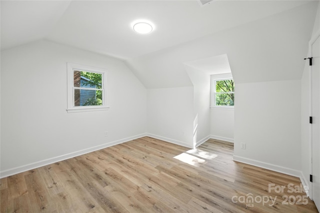 6127 Eagle Peak Dr, Charlotte, NC 28214 - bonus room with lofted ceiling and wood finished floors