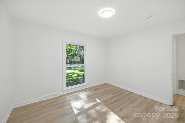 6127 Eagle Peak Dr, Charlotte, NC 28214 - unfurnished room with light wood-style floors and baseboards