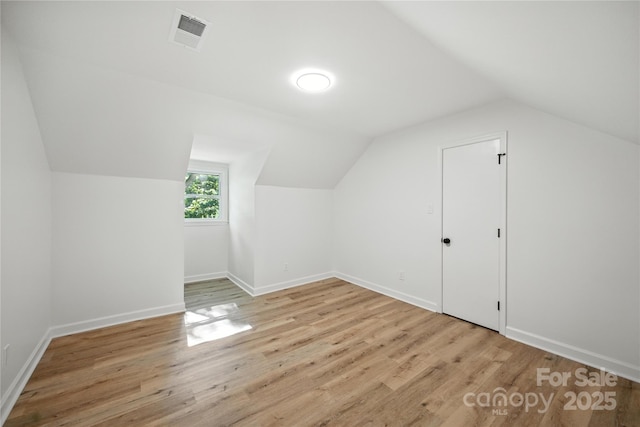 6127 Eagle Peak Dr, Charlotte, NC 28214 - bonus room with light wood-type flooring and lofted ceiling