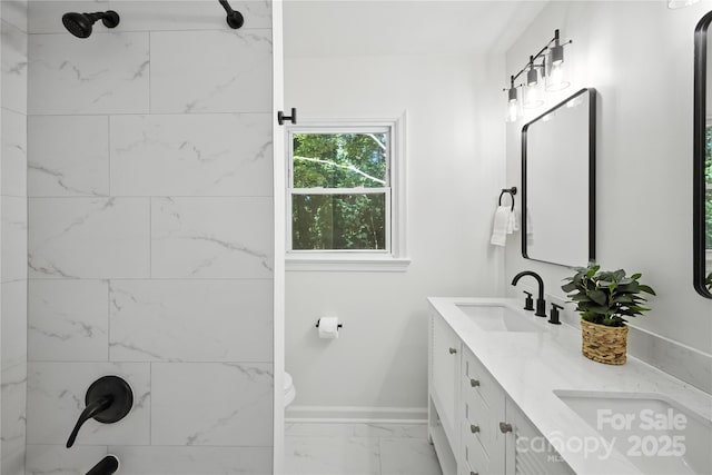 6127 Eagle Peak Dr, Charlotte, NC 28214 - full bath featuring marble look tile flooring, double vanity, and a shower